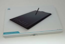 A boxed as new Huion New 1060 Plus Graphics Drawing Tablet. 10 x 6.25inch Digital Drawing tablet