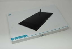 A boxed as new Huion H610 Pro Graphics Drawing Pen Tablet with 8 Keys. 8192 Pressure Levels.