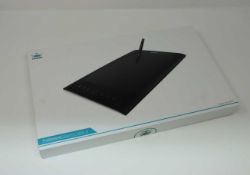 A boxed as new Huion H610 Pro Graphics Drawing Pen Tablet with 8 Keys. 8192 Pressure Levels.