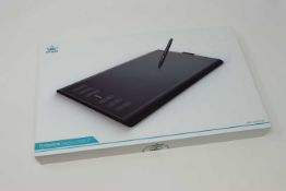 A boxed as new Huion New 1060 Plus Graphics Drawing Tablet. 10 x 6.25inch Digital Drawing tablet