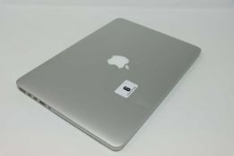 A pre-owned MacBook Pro A1502 sold for parts (Serial: C02P909RG3T) (Power on and displays. HD