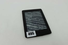 A pre-owned Amazon Kindle Paperwhite (DP75SDI) 6” E-Reader in Black.