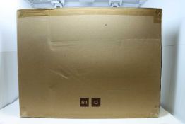 A boxed as new Mi Robot SDJQR02RR Vacuum Cleaner in White. Bagless, HEPA filter, 0.42litres.