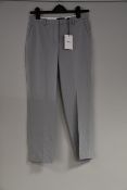 A pair of as new Theory Treeca cropped trousers in mist blue (Size 0 - RRP $295).