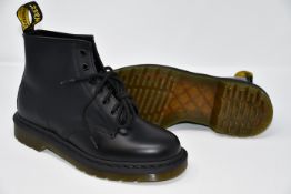 A pair of as new Dr Martens 101 boots in black (UK 6).