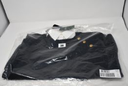 An as new Ralph Lauren ladies black jumper with attached shirt and shoulder buttons (M).