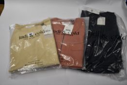 Three items of as new Indi & Cold clothing; a Mono jumpsuit (XL), Chaqueta top (XL) and Jersey