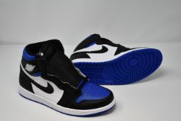 A pair of as new Nike Jordan 1 Retro Hi Tops (UK 9.5).
