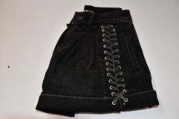 An as new pair of The Kooples lace up denim shorts (Size 2 - RRP €165).