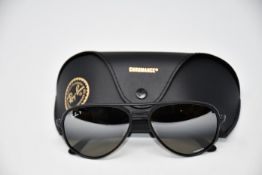 A pair of as new Ray Ban sunglasses.