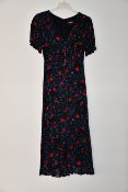 An as new The Kooples Poison Roses on Georgette dress (Size 3 - RRP £318).