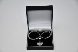 Three pairs of boxed as new Paula Bolton Bauhaus pendants (9917/2).