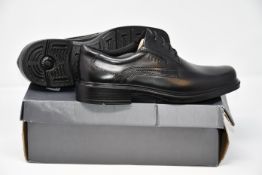 Two pairs of as new Ecco footwear; Helsinki shoes in black (UK 9-9.5) and Biom Street (UK 11.5).