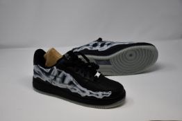 A pair of as new Nike Air Force 1 '07 Skeleton QS trainers (UK 9).