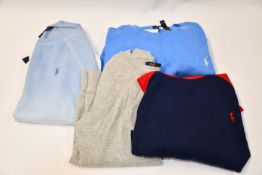 Three as new assorted children's Ralph Lauren tops and one Ralph Lauren blue crewneck jumper (