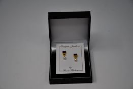 Three pairs of boxed as new Paula Bolton Vermeer earrings (9142).