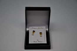 Three pairs of boxed as new Paula Bolton Vermeer earrings (9142).