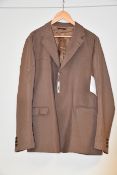 One man's pre-owned Prada single breasted jacket in light brown (This item has a tiny hole on the