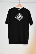 An as new Burberry T-shirt (M).