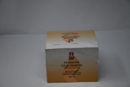 Twelve boxed as new TLM Colour Changing Foundation 30ml (TLM-F054B).