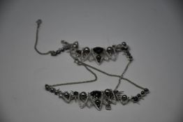 Eight as new Swarovski necklaces/chokers with clear/black crystals and grey pearls (Unboxed, No