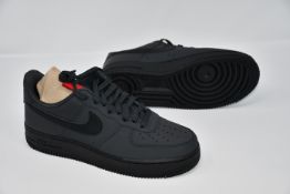 A pair of as new Nike Air Force 1 '07 trainers (UK 7).