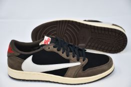 A pair of as new Nike Air Jordan 1 Low OG SP-T Travis Scott trainers (UK 10.5).