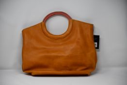 An as new Able Fozi Ring tote in cognac/rose (RRP $168).