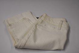 A pair of DL Florence mid rise Instasculpt skinny jeans (Size 24?) (Slight mark requires