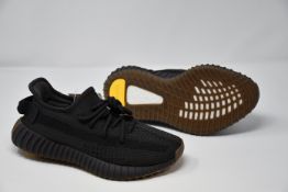 A pair of as new Adidas Yeezy Boost 350 V2 trainers (UK 4.5).