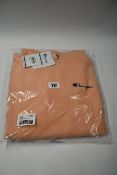 Two as new Champion relaxed hoodies with chest logo in light pink (Both L).