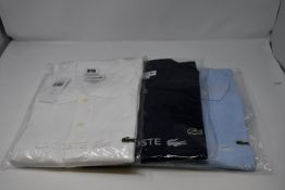 Three as new Lacoste polo shirts (FR 5, 7, 9).