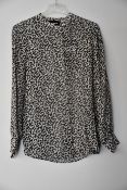 An as new The Kooples blouse (Size 0 - RRP €198).