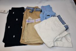 Three pairs of as new children's assorted Ralph Lauren shorts and two pairs of children as new Ralph