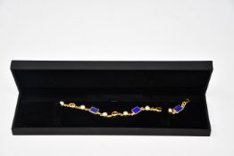 One lady's boxed as new Paula Bolton Vermeer bracelet.