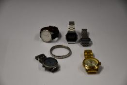 Five assorted pre-owned wristwatches to include Michael Kors, Daniel Wellington, Activa and Casio.