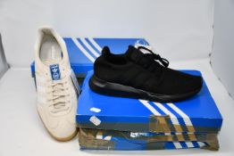 Two pairs of as new Adidas trainers; Swift Run (UK 8) and Gazelle Indoor (UK 12).