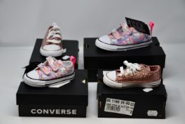 Three pairs of toddler Converse CTAS 2V Lo Unicorn trainers (UK 3, 4, 9) together with two pairs