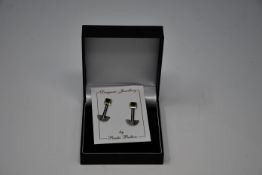 One pair of Bauhaus earrings, one Bauhaus pendant and one Vermeer pendant, all by Paula Bolton and