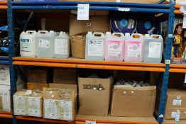 Two shelves of hand wash/sanitizers and related items.