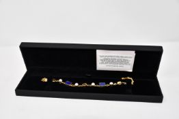 One lady's boxed as new Paula Bolton Vermeer bracelet.