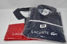 An as new Lacoste shirt in blue (US 16.5 - RRP £95) and a Lacoste polo shirt (US XL/FR 6 - RRP £