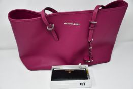 A pre-owned Michael Kors bag together with an as new Michal Kors Jet Set Charm zip card case.