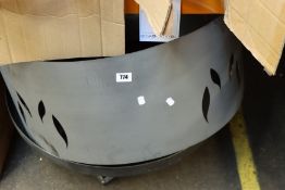 One as new unboxed fire pit.