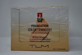 Twelve boxed as new TLM Colour Changing Foundation 30ml (TLM-F054B).