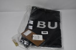 A Burberry woven logo scarf.