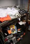 A large quantity of assorted clothing and related items.
