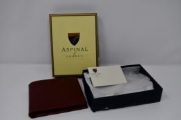 An Aspinal of London leather wallet (Damage to box).