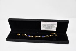 One lady's boxed as new Paula Bolton Vermeer bracelet.