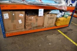 Five boxes of assorted face masks in various designs and sizes.